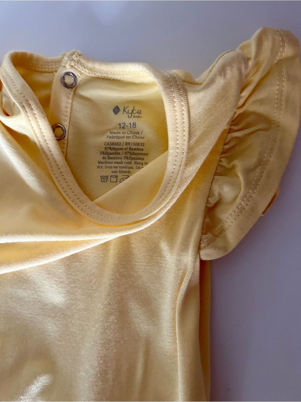 Kyte BABY Pale Yellow Ruffle Sleeve Dress Onesie - Picture 2 of 2